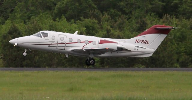 Beechcraft Beechjet (N75RL) - A 2001 model (serial number RK-312) Beech Beechjet 400A departing Boswell Field, Talladega Municipal Airport, AL after NASCAR'S 2023 Geico 500 Race @ Talladega Superspeedway - around 6:50pm, April 23, 2023.
