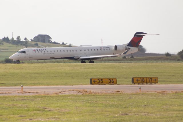 Canadair Regional Jet CRJ-900 (N329PQ) - Leaving SLN after storage during COVID-19. 