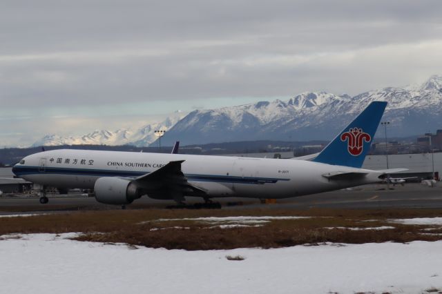 BOEING 777-200LR (B-2071) - Takeoff viewed from west side of Runway 15-33