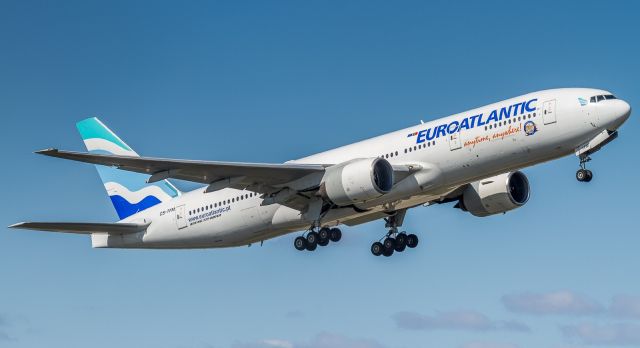 BOEING 777-200LR (CS-TFM) - Rare visit of this EuroAtlantic triple, here blasting off of runway 06L