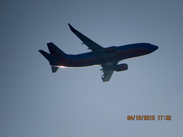 BOEING 737-300 (N365SW) - Southwest flight 40 from Dallas Love to Tulsa over OneOK field in Tulsa.