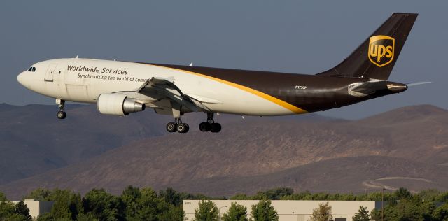 Airbus A300F4-600 (N173UP) - A UPS heavy (N173UP) is captured here as the mains begin reaching for the runway to complete a short Sacramento-to-Reno (KMHR-KRNO) early evening trip.