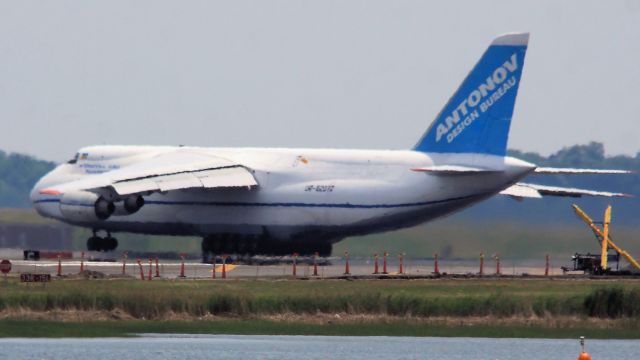 Antonov An-124 Ruslan (UR-82072) - UR-82072, an Antonov Design Bureau AN-124 as flight ADB1950 from Boston (KBOS) to Porto / Oporto Airport (Francisco Sa Carneiro Int.).  Cargo is vans.  She is on the takeoff roll at Boston runway 15 right. She just passed rotate and will be airborne in seconds.  This is the view from Constitution Beach, just across from the 22s.