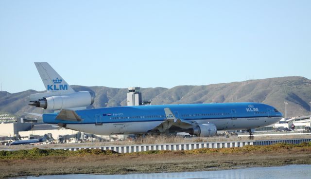 Boeing MD-11 (PH-KCI) - An Old Bird, Taxiing to 28L for take off. Take off noise was huge compared to the A340