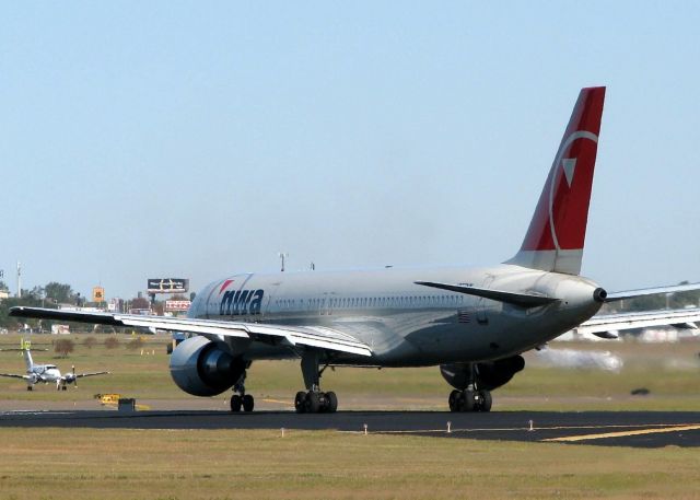 Boeing 757-200 (N557NW) - Starting to roll on Runway 32 at Shreveport Regional.