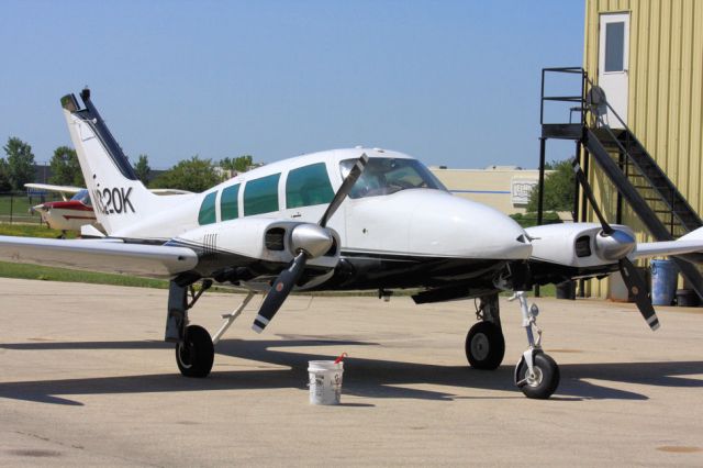 Cessna Executive Skyknight (N320K) - Parked at E21 at KDPA after a flight from KJVL