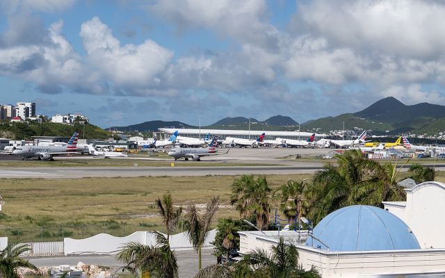 Airbus A319 (N9022G) - View from the Morgan Hotel viewing deck towards Princess Juliana International Airport terminal 2024