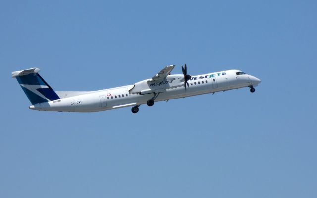 de Havilland Dash 8-400 (C-FQWE) - Shown here departing is a Westjet de Havilland Dash 8-400 in the Spring of 2018.