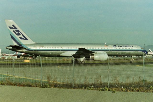 Boeing 757-200 (N502EA) - KSFO - Another faded negative and fence job, as I was headed to SFO for Saturday AM photos, I could see the Eastern 757 rolling to 1-R for departure, and I think I invented 'road rage' on this one..I punched it up to about 95mph to make the Millbrae Ave off from from 101 cutting people off, California stopped the off ramp, tailgated some poor grandma headed to the Terminal passed on the right nicely and made the SFO Millbrae Ave Airpark as a United Airlines 727 powered up for take off, Eastern 757 was powering up to position and hold. Luckily back then Saturday AMs at the parking lot were not full. I skid into the slot, I knew I'd miss the shot if I tried to get the 8ft ladder up to clear the fence ( tick tock tick tock) and of course no hold, as clear 28LR landing pattern, nothing so the Eastern powers up and all I could do was stand on the pickup bed railing and snap a few photos.