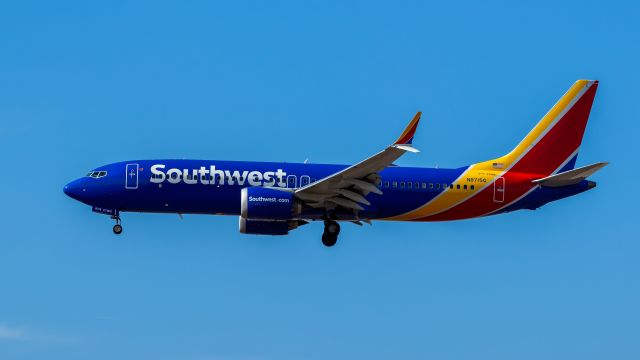 Boeing 737 MAX 8 (N8715Q) - Southwest Airlines 737 MAX 8 landing at PHX on 8/9/22. Taken with a Canon 850D and Rokinon 135mm f/2 lens.