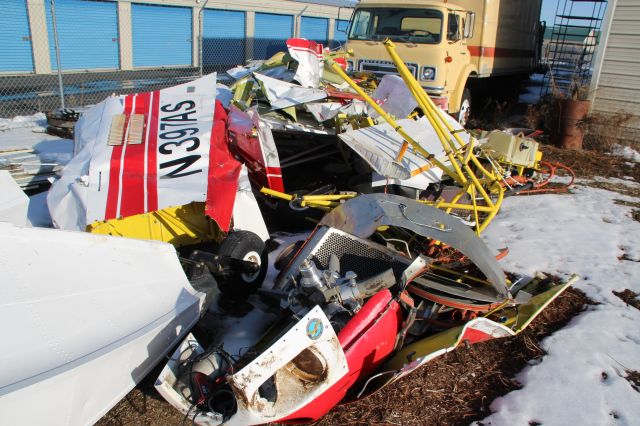 Air Tractor AT-802 (N397AS) - After ingesting debris while fighting a fire as Fire Boss 242, the engine failed, resulting in a forced landing into treetops. Was taken apart, and now sits in a junkyard in Deer Park. Photographed January 26th, 2019.