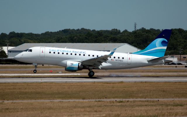 Embraer 170/175 (N176EC) - California Pacific ERJ 170-100 LR landing on runway 2 left after a go around in gusting winds. It taxied to the Embraer facility.