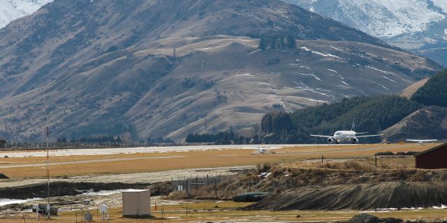 Airbus A320 (ZK-OJO) - 24 August 2011. Taken from the roof of the Queenstown International Airport roof, OJO lining up on the runway for takeoff out of paradise.