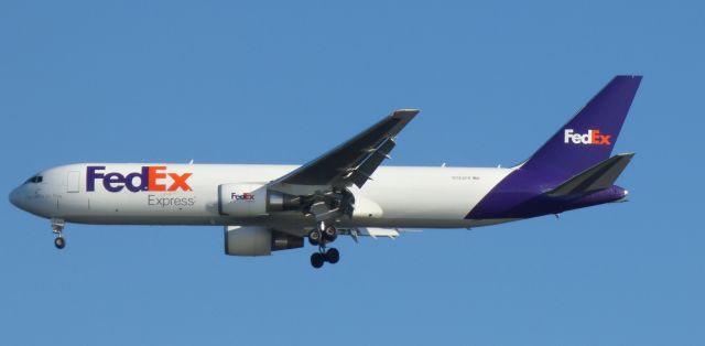 BOEING 767-300 (N145FE) - This FedEx Express is seconds from landing, summer 2018.