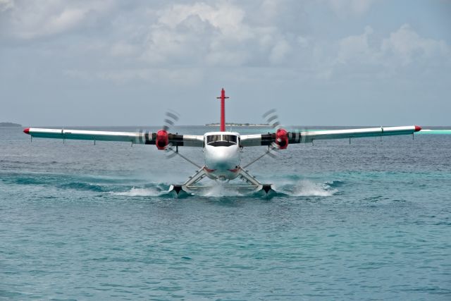 Boeing 757-200 (8Q-MAI) - A DHC Twin Otter landing at a resort in the Maldives