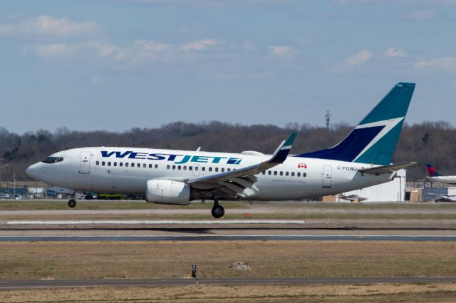 Boeing 737-700 (C-FGWJ) - WestJet is arriving into Nashville from Calgary CYYC on Runway 2L at 2:35 PM on March 18, 2019. This was the first time I have seen a WestJet aircraft. Shot on Nikon D3200 at 200mm.