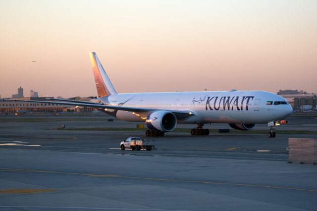 BOEING 777-300ER (9K-AOF) - KAC117 taxying to the gate past the JetBlue terminal.