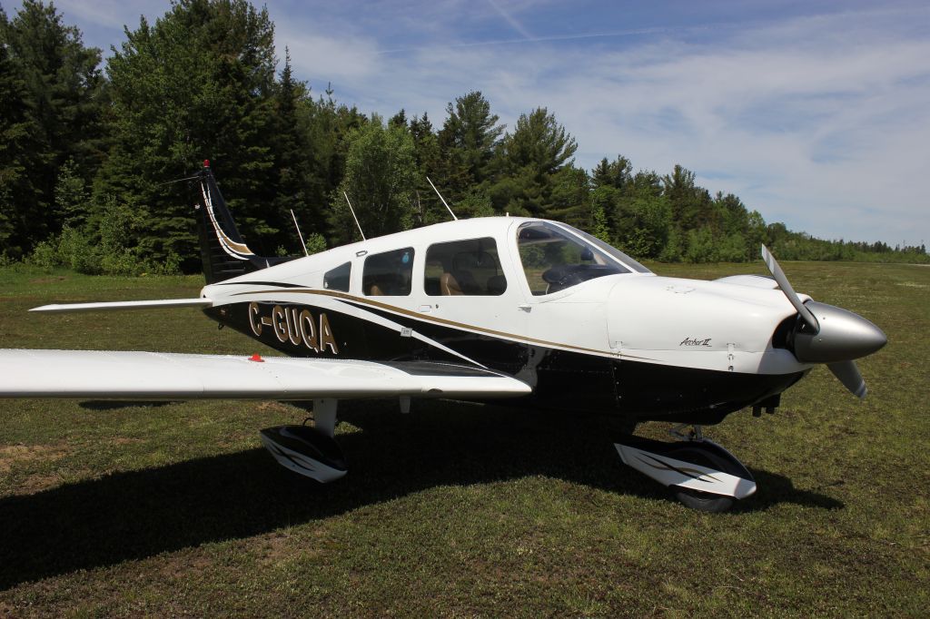 Piper Cherokee (C-GUQA) - C-GUQA Piper PA-28-181 Archer ll St-Omer Aviation QC. RVA-Aéroport du lac à la Tortue QC. CSL3 08-06-2019.