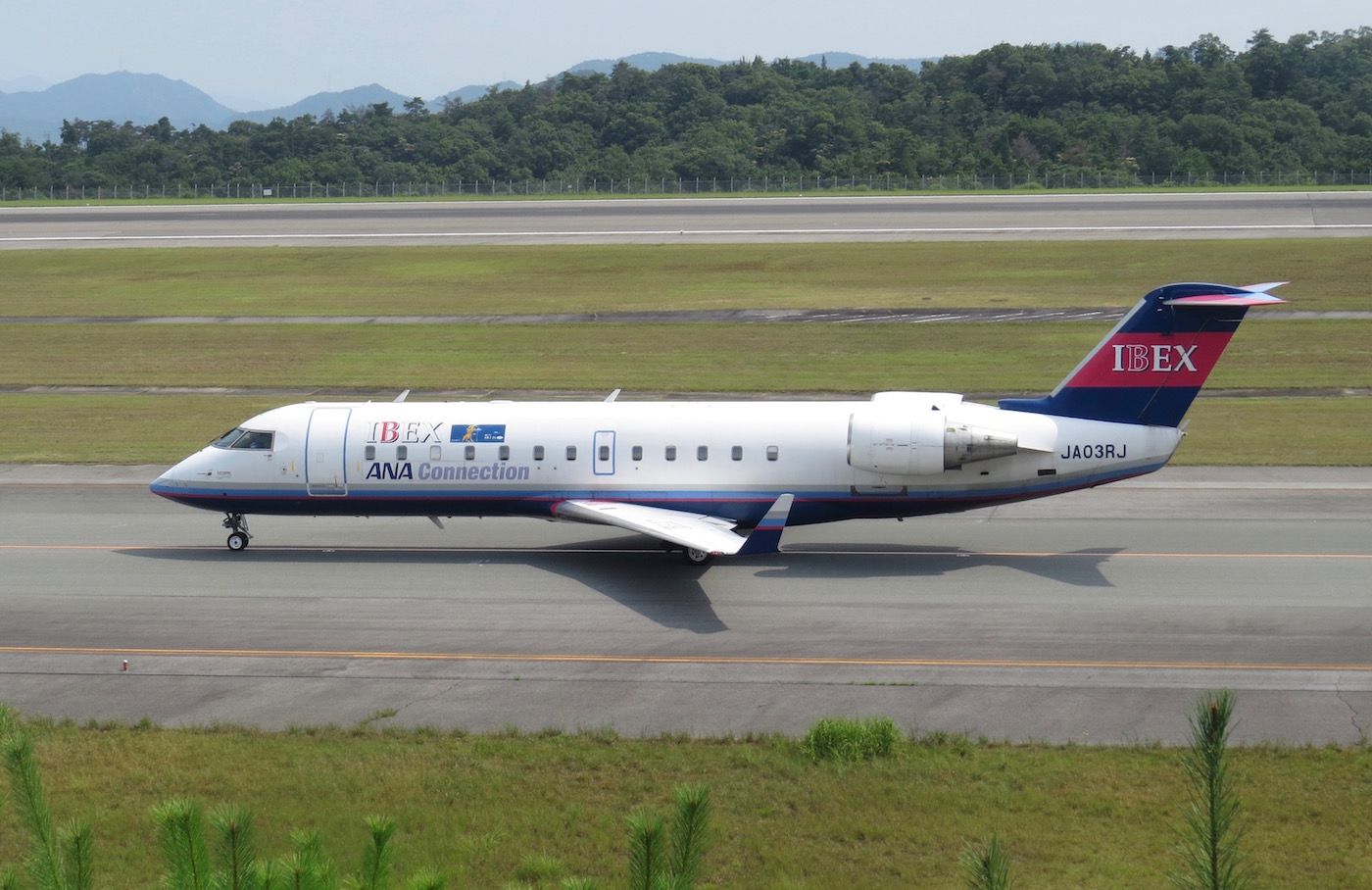 Canadair Regional Jet CRJ-200 (JA03RJ) - Bombardier Regional Jet of IBEX on its way to Sendai taxiing to rwy 28 at Hiroshima airport.
