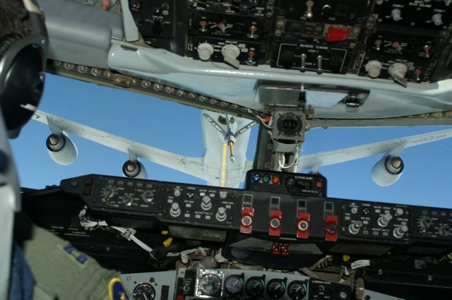 Boeing C-135FR Stratotanker (58-0018) - Taking on gas from another of our KC-135s. Were on track AR330, just north of Wichita, starting our turn back down track.