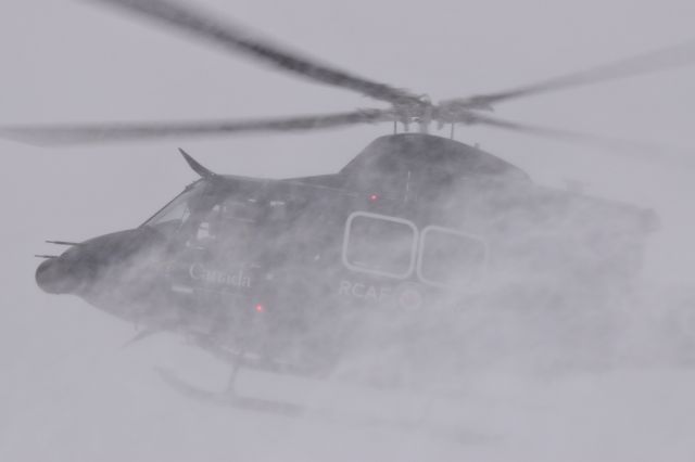 Bell 412 (C-FYZQ) - RCAF Bell 412 creating my very own personal blizzard on departure from Yorkton. There was a miniature snowdrift in my cameras lens hood after it passed. This is the kind of snowblower i want lol. 