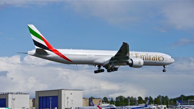 BOEING 777-300 (A6-ENP) - BOE212 on final to Rwy 16R to complete a flight test on 4/22/14. (LN:1193 / cn 41362).