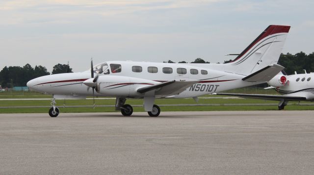 Cessna Conquest 2 (N501DT) - A Cessna 441 Conquest II taxiing along the ramp at Gulf Air Center, Jack Edwards National Airport, Gulf Shores, AL - June 27, 2017.