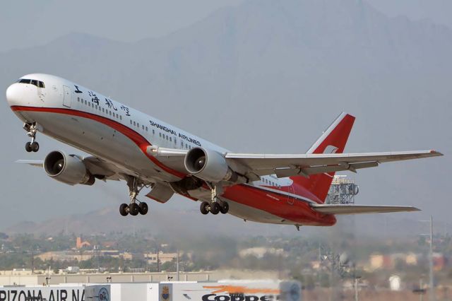 BOEING 767-300 (N668AC) - Shanghai Airlines Boeing 767-36DER N668AC departing from Phoenix Sky Harbor for Saipan on August 2, 2018. It arrived at Sky Harbor from Pinal Airpark on August 1.