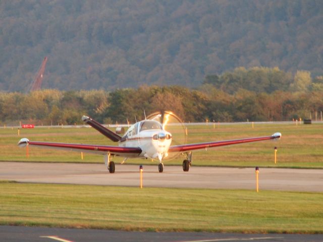 Beechcraft 35 Bonanza (N519PH) - Taxiing to the hold short position.