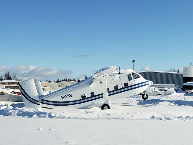 Short Skyvan (N1158) - A little too much snow on the tail...