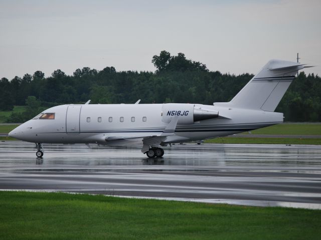 Canadair Challenger (N518JG) - JOE GIBBS RACING INC (NASCAR team owner Joe Gibbs) arriving back home KJQF - 6/17/13