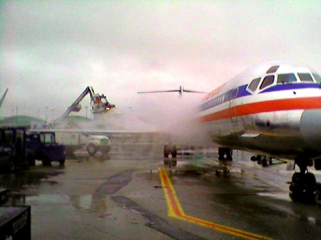 McDonnell Douglas MD-80 — - AAs deicing operation at ORD.