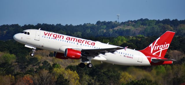 Airbus A320 (N848VA) - Virgin... er, Alaska... Virgin, "Bellapierre" departs to SFO from RDU, 4/14/18. From the top of the RDU parking deck.