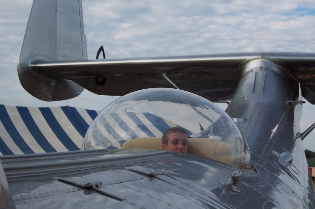 — — - EAA 2005 my son Jordan in the observation bubble of a Dornier Do-24.