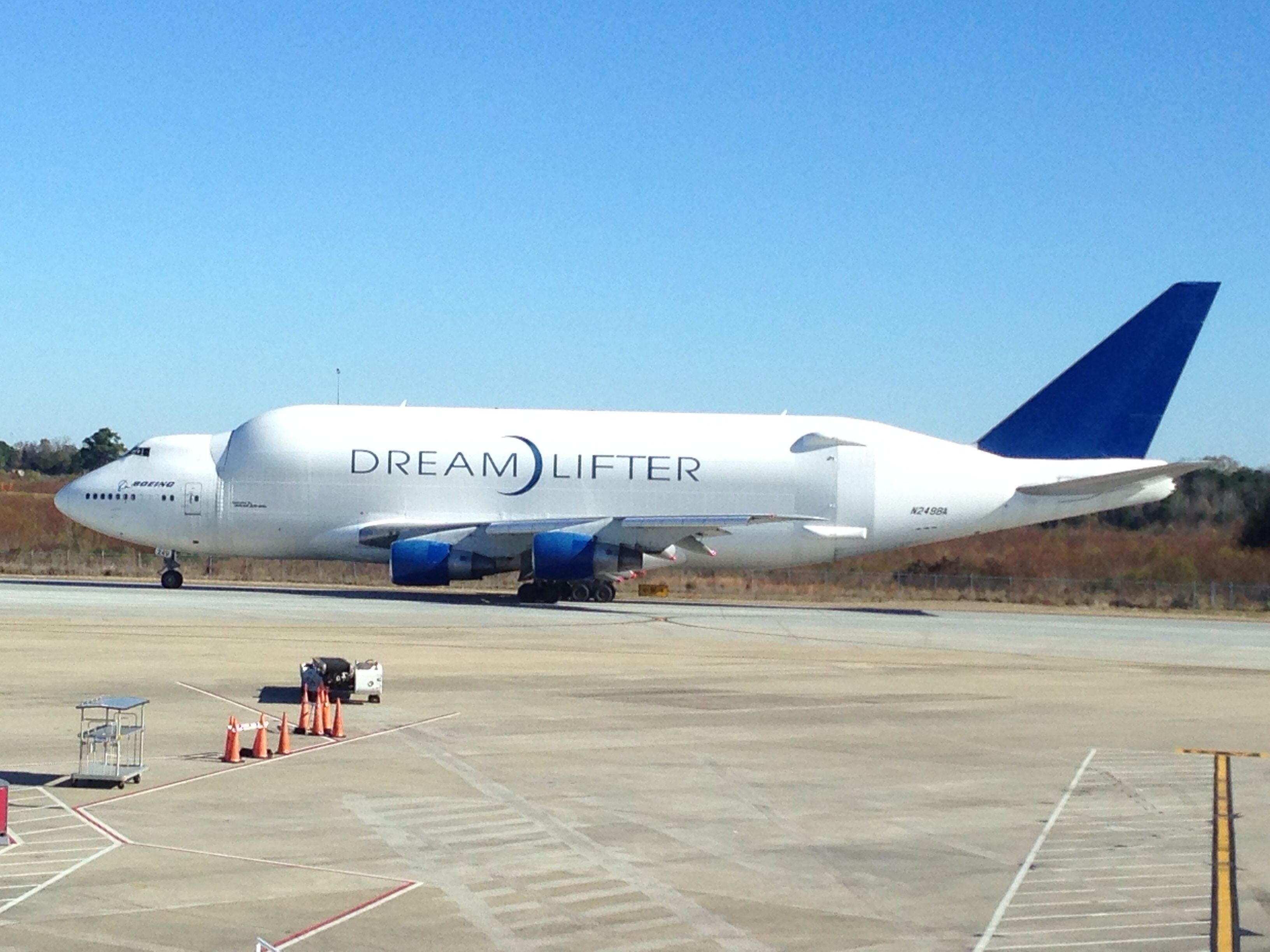 Boeing 747-200 (N2498A) - Boeing Dreamlifter departing Charleston International / Joint Base Charleston on 18 December 2013 as seen from Terminal B.