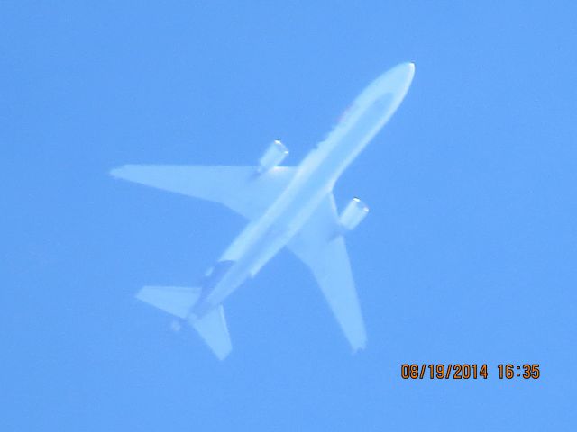 Boeing MD-11 (N575FE) - FedEx flight 781 from MEM to PDX over Baxter Springs KS (78KS) at 36k feet.