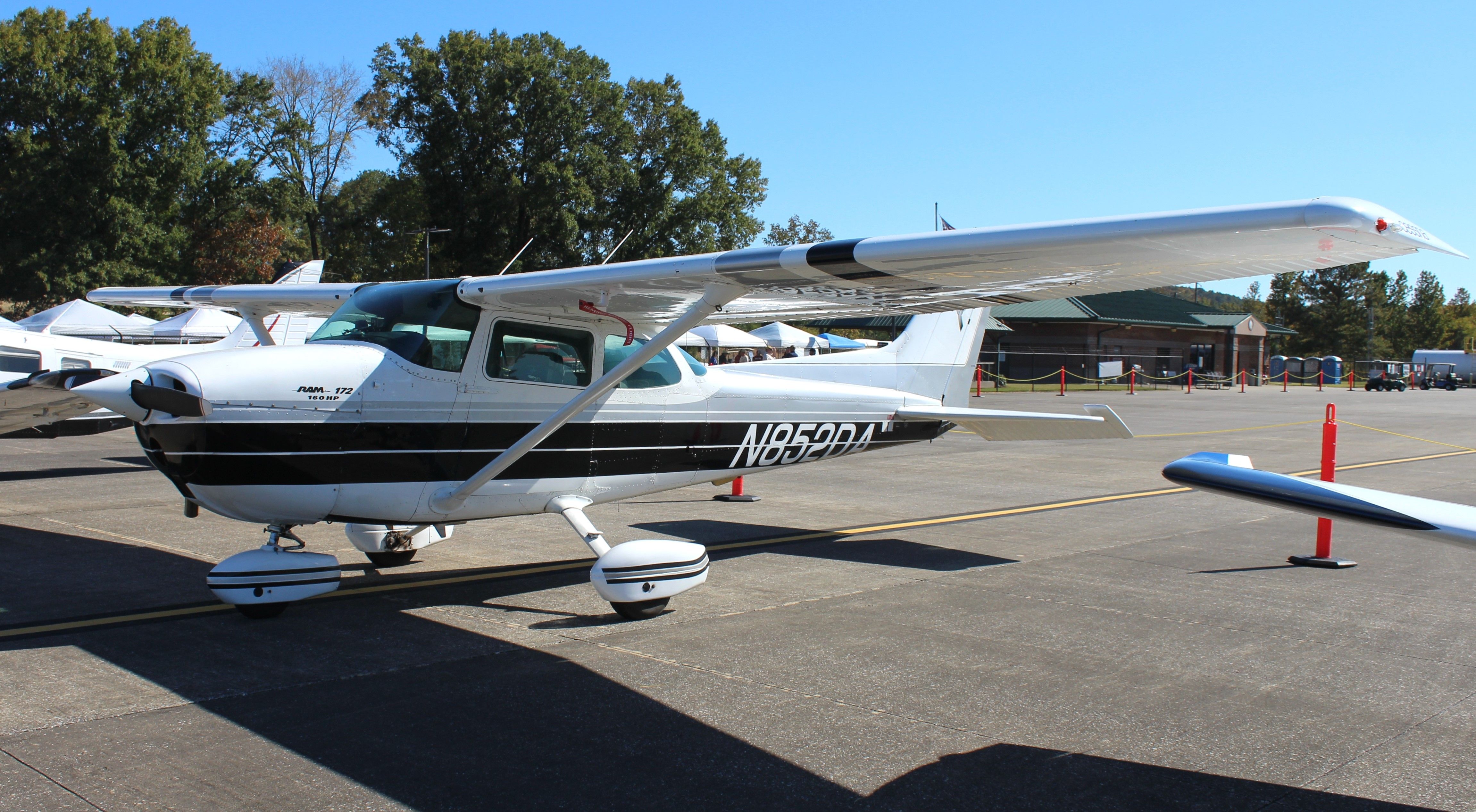 Cessna Skyhawk (N852DA) - A 1975 model Cessna 172M Skyhawk on the ramp during Aviation Career Day 2022 at St. Clair County Airport, Pell City, AL - October 8, 2022.
