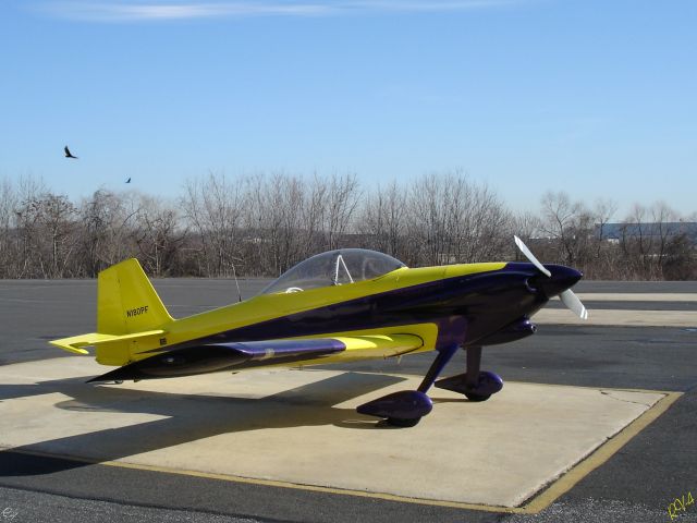 N180PF — - Great little two seater with even a greater pilot....On the Tarmac at the KPNE Jet Center from time to time.  Shown here in the Spring of 2006.