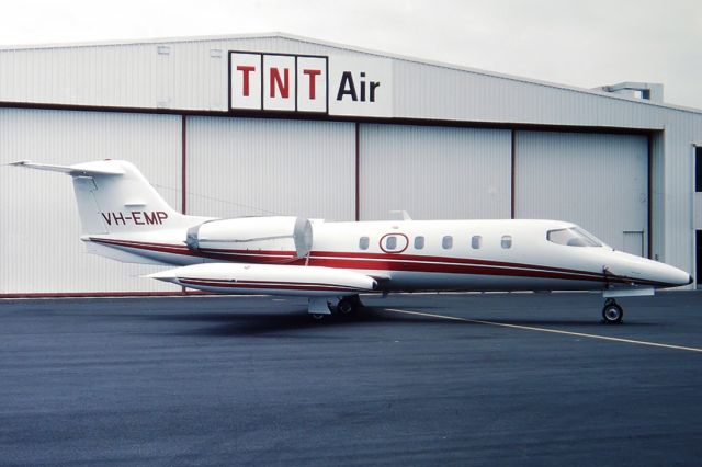 Beechcraft Baron (58) (VH-EMP) - GATES LEARJET 35A-34S - REG : VH-EMP (CN 35A/345) - - ADELAIDE INTERNATIONAL AIRPORT SA. AUSTRALIA - YPAD (13/11/1989) 35MM SLIDE SCANNED AT 6400 DPI.