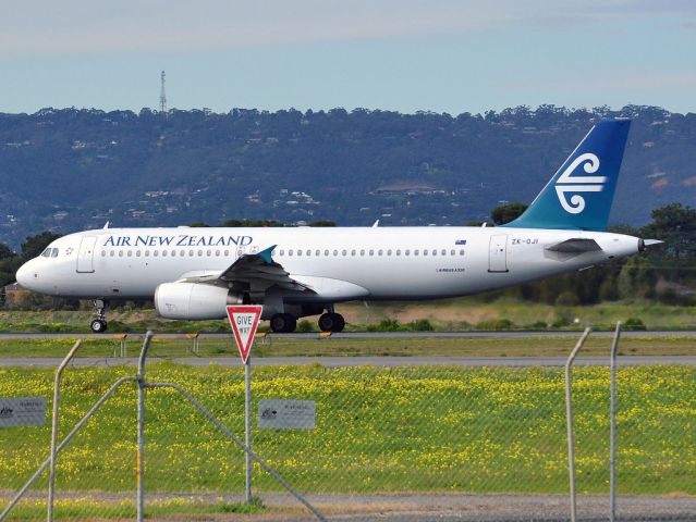 Airbus A320 (ZK-OJI) - Rolling for take off on runway 05, for flight home to Auckland, New Zealand. Thursday 12th July 2012.