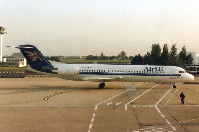 Fokker 100 (G-UKFE) - Seen here on 17-Oct-94.br /br /Reregistered PH-OFE 26-Aug-03 for KLM Cityhopper.br /Registration cancelled 10-Jan-11. Preserved on visitor terrace at EHAM.