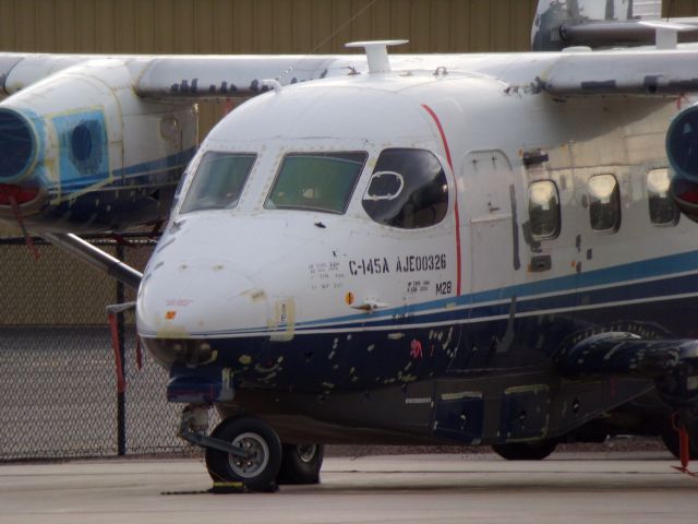 N279DH — - This C-145A Combat Coyote/Skytruck sits in KAPA. I was standing on the other side of it near the Key Lime building.