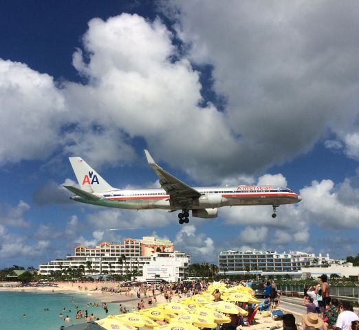 Boeing 757-200 (N199AN) - View from the Sunset Bar and Grill on Maho Bay in Sint Maarten