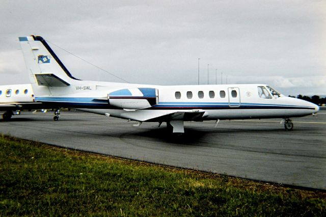 Eurocopter AS-350 AStar (VH-SWL) - CESSNA 550 CITATION II - REG : VH-SWL (CN 550/0188) - ADELAIDE INTERNATIONAL AIRPORT SA. AUSTRALIA - YPAD 26/10/1986 35MM SLIDE CONVERSION USING A LIGHTBOX AND A NIKON P80 DIGITAL CAMERA IN THE MACRO MODE.