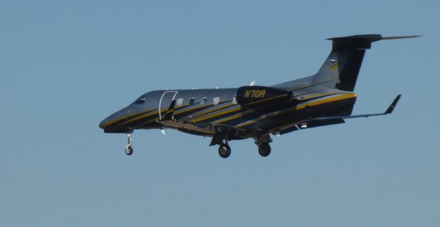 Embraer Phenom 300 (N7DR) - On final is this 2015 Embraer Phenom 300 from the Winter of 2021.