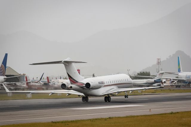 Bombardier Global Express (N145QS) - Bombardier Global 6000 rotation on a rainy day on St Maarten