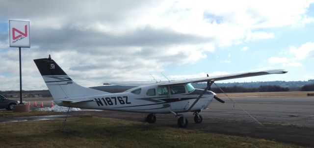 Cessna 205 (N1876Z) - Catching some tarmac time is this 1962 Cessna 205 Centurion the Winter of 2023.