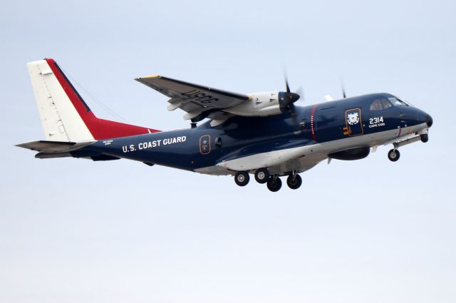 2314 — - 'Coast Guard 2314', in Centennial paint scheme, working the pattern