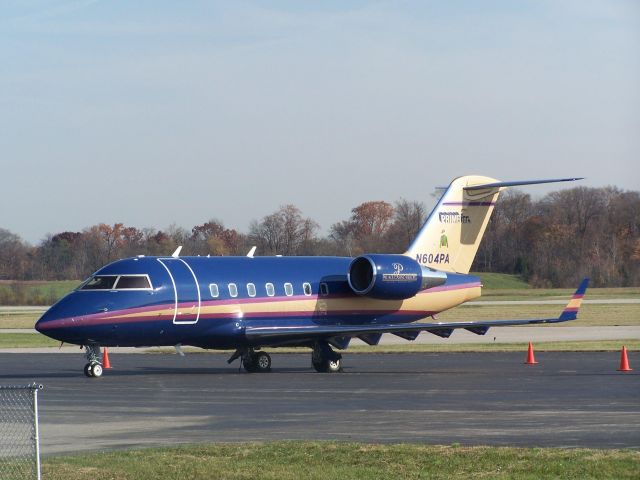 Canadair Challenger (N604PA) - Challenger 604 (c/n 5566) Parked up for Derby Day, superb colour scheme at Clark County Jeffersonville IN ...Photo by Mike Day