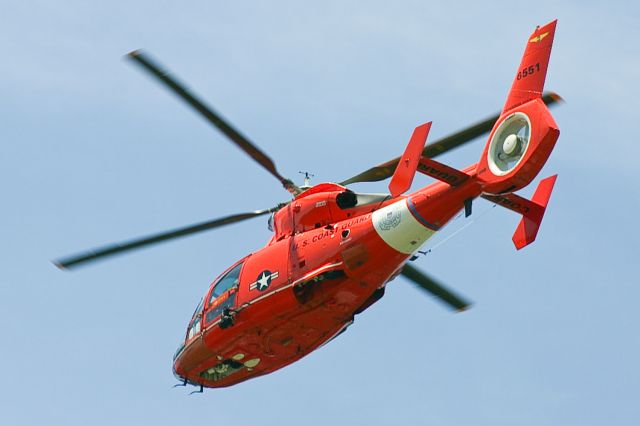 N6551 — - US Coast Guard 6551, a Dauphin-class helicopter, flys over the 2006 Appleton,. WI Flag Day Parade.